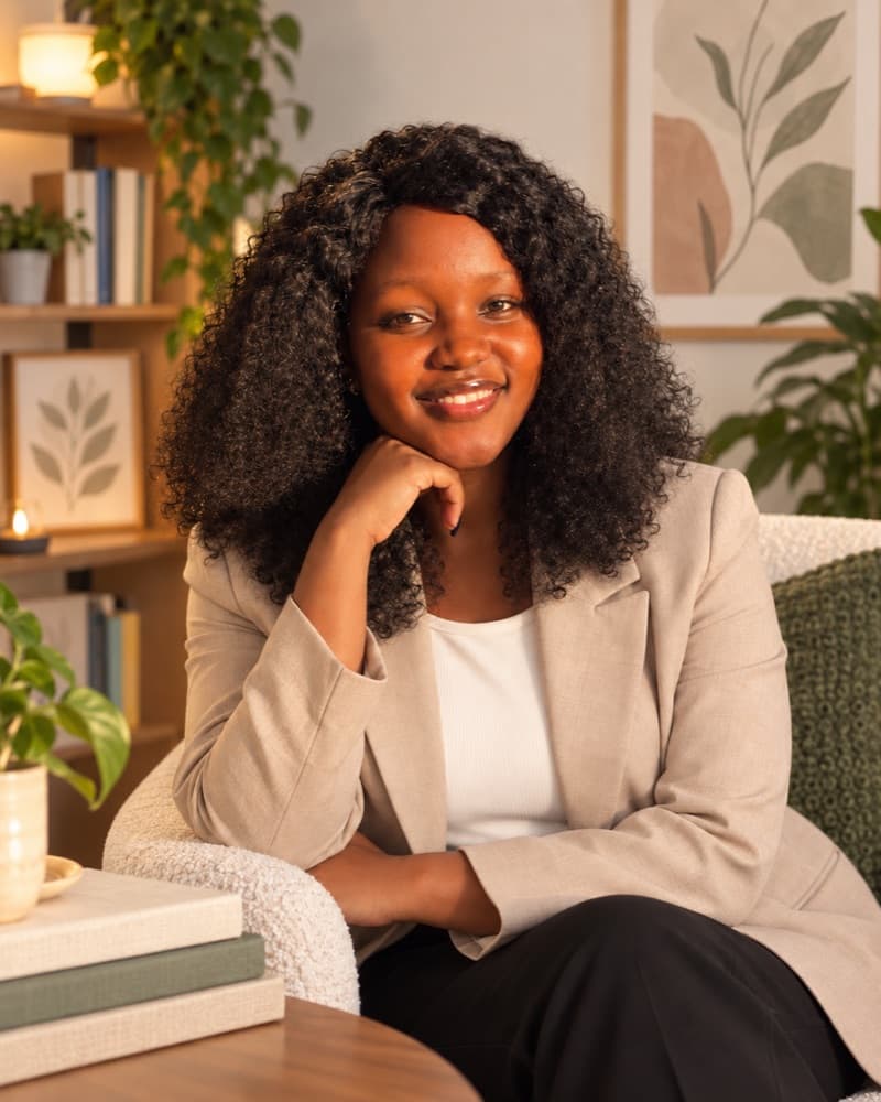 Minneh Kimunya, seated in her consulting room